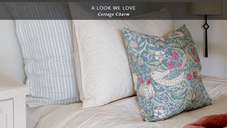A cozy, inviting cottage bedroom styled with soft, pastel cotton bedding, showcasing a charming and relaxed look for a cozy home.