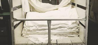 Red Land Cotton Linens Being Prepared For Sale