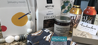 A collection of American-made gifts, including Red Land Cotton products, beautifully displayed for a thoughtful gift guide.